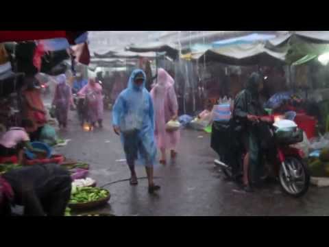 Monsoon shower at Doeum Kor market, Phnom Penh, Cambodia