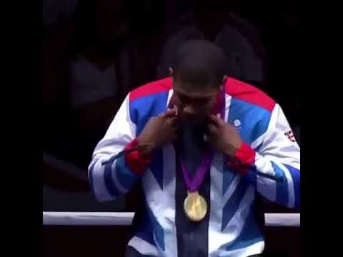 Young Anthony Joshua receiving his gold Olympic medal