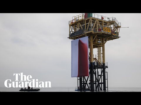 Greenpeace activists install giant Anish Kapoor artwork onto active shell platform
