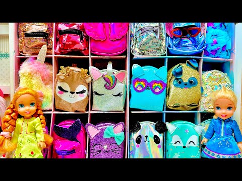 Elsa and Anna toddlers at the backpack store