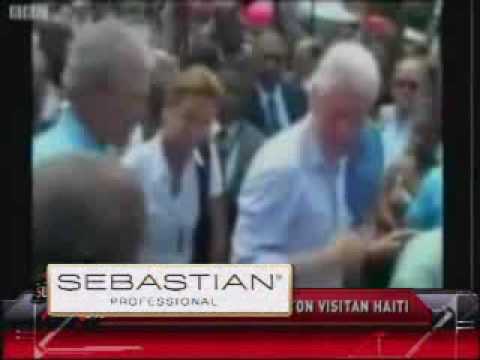 SuperXclusivo 3/25/10 - George Bush limpia mano despues de saludar haitiano