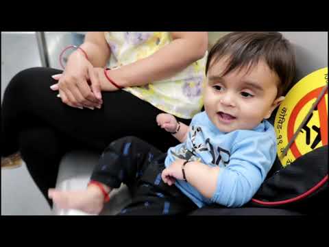 Very cute 10 month baby playing Delhi metro new baby in blue motion face behaviour expression happy