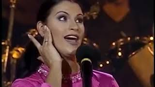 Olga Tañon ( EL FRÍO DE TU ADIÓS )