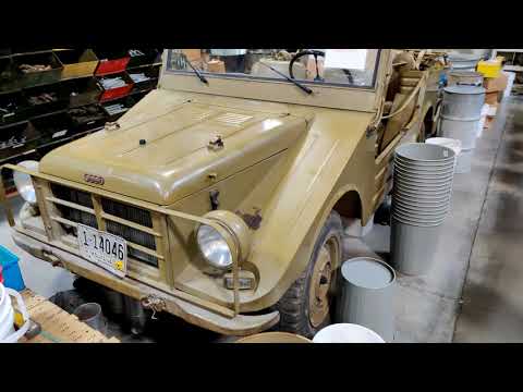 1957 Auto Union Munga and others in military surplus store