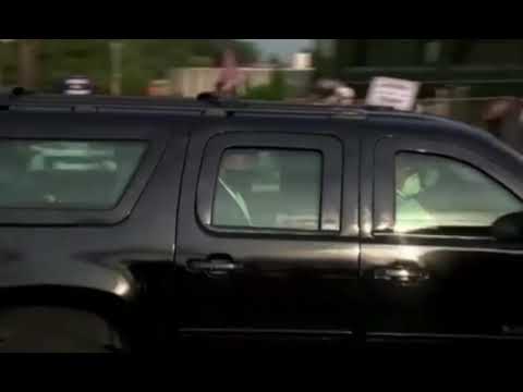 Trump in motorcade surprises supporters outside hospital with drive by