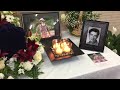 Memorial table display with ashes for funeral service.