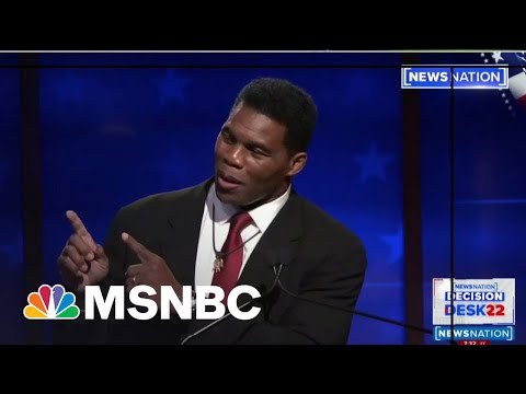 Herschel Walker Takes Out Prop On Stage At The Georgia Debate