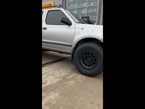AWT - Nissan Frontier on 16x8 Method Race MR315 Wheels In Black & Toyo Open Country A/T III Tires