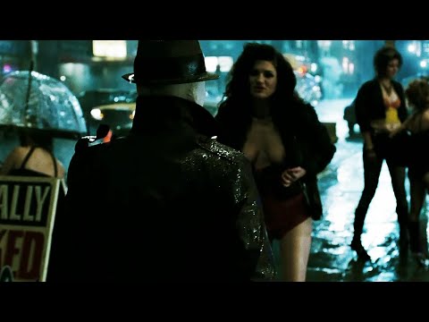 Watchmen Rorschach walks through the noir city at night. Rorschach's Journals