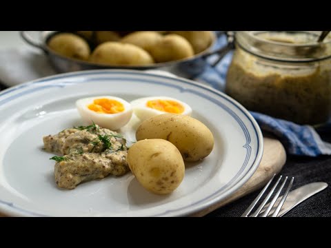 Delicious pickled herring in mustard sauce