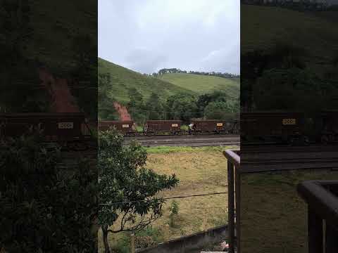 COO 1205, GE C36-7 #3878-7 e #3839-6 com vagões HAT partindo do pátio de Dias Tavares.