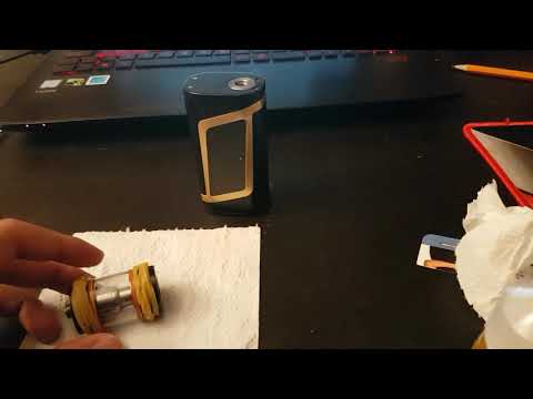 Part of a video titled How To: Open a Tight Vape Tank - YouTube