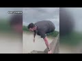 Viral video shows man jump from I-10 bridge during gridlock