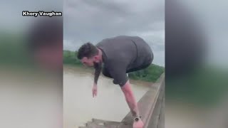 Viral video shows man jump from I-10 bridge during