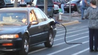Left Gas Nozzle in Car (Prank)