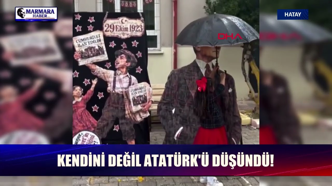 Kendini değil, Atatürk'ü düşündü! Minik Meryem Atatürk maketi ıslanmasın diye şemsiye tuttu, yürekleri ısıttı