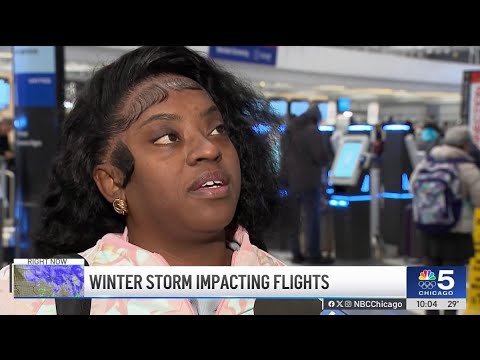 Snowstorm prompts flight delays, cancellations amid Thanksgiving travel