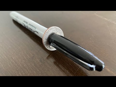 Sharpie thru Quarter (1 Side) by Tango