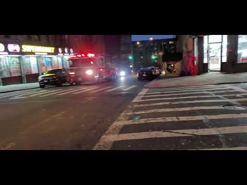 FDNY Ladder 56 Responding With Air Horns On East 184th Street In Fordham, The Bronx, New York City
