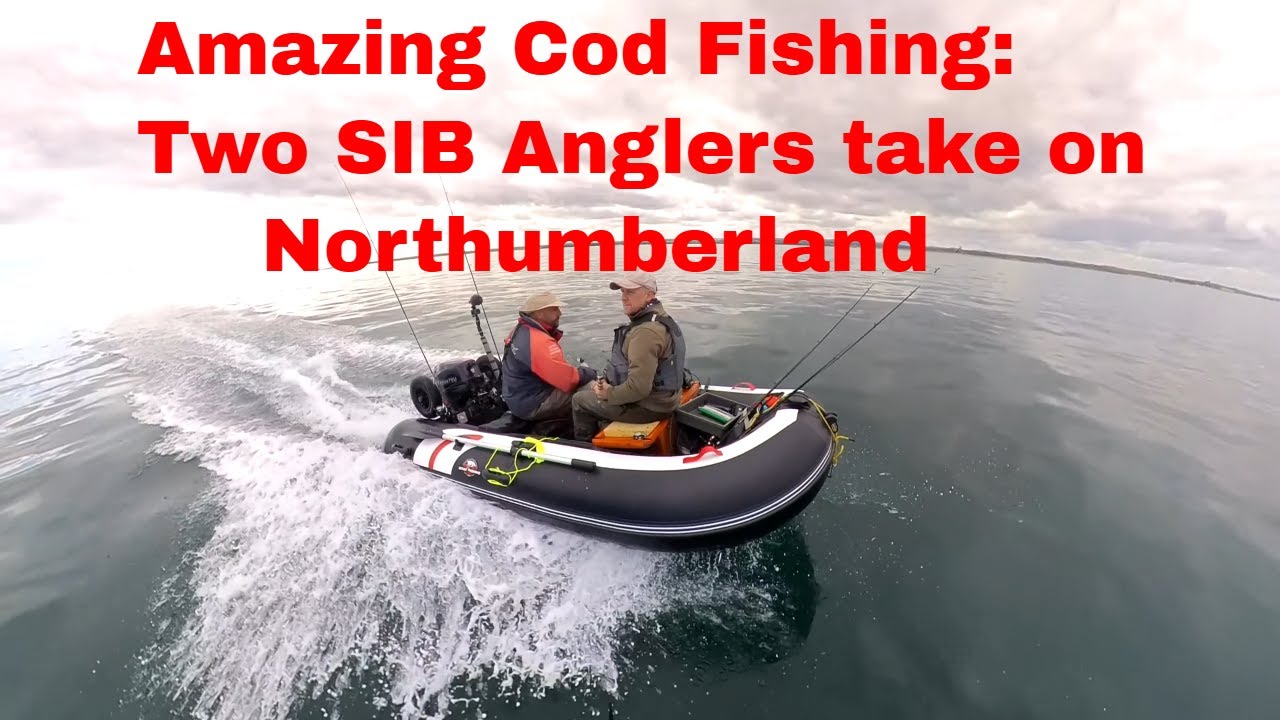 Two men out at sea on a SIB with rods at the ready