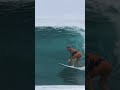 Surfer girl gets barreled in Hawaii