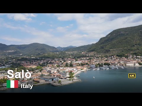 See the Salò on the famous Lake Garda in Italy from above - Italy 4K