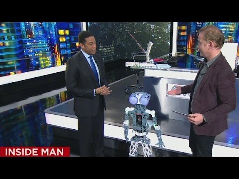 Don Lemon and Morgan Spurlock do the robot