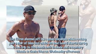 Shirtless Zac Efron shares a laugh with a mystery blonde in Costa Rica What's your view? Be the firs