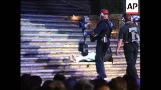 Grace Jones rolls down steps