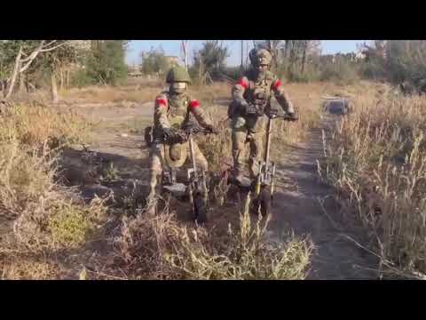 Russian Soldiers riding Scooters somewhere in Ukraine