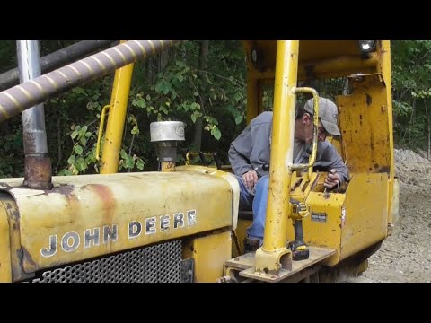 John Deere 450B Shift Linkage Adjustment by Mike and Mark