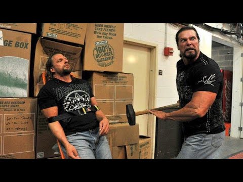 Kevin Nash assaults WWE COO Triple H with a sledgehammer: Raw SuperShow, October 24, 2011