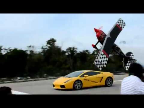 Skip Stewart flying a knife edge, while racing a Lamborghini.