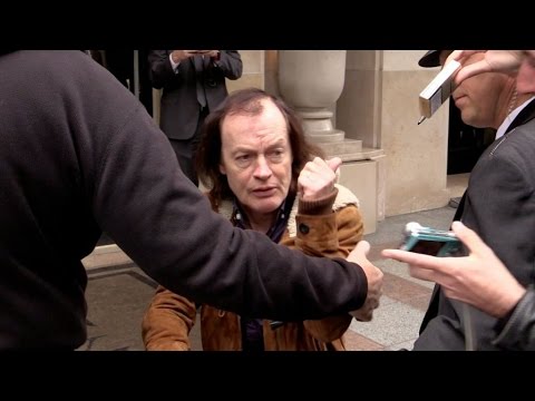 GRANDPA Angus Young from AC DC leaving his hotel and Paris