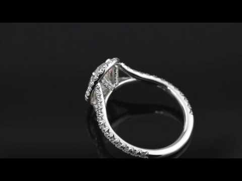 Hand Forged Micro Pave Halo Featuring a 1.75 Carat F-VS2 Oval Brilliant Diamond Center.