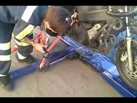 HOW TO TOW A MOTORCYCLE ON A WHEEL LIFT