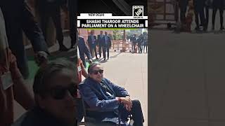 Congress MP Shashi Tharoor attends Parliamentary proceedings in a wheelchair