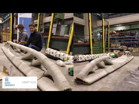 3D concrete printing of a topology-optimized bridge