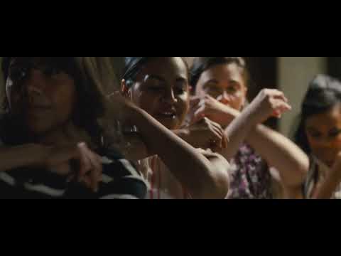 The Sapphires trailer still — end-credit concert glow as the group nails a final soul vamp