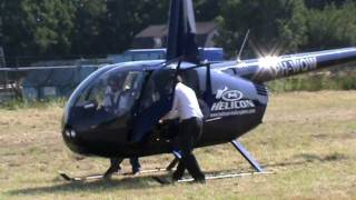 preview picture of video 'Pagani productions @hobma modelbouw show elst 4-6-2011 robinson r44 raven'