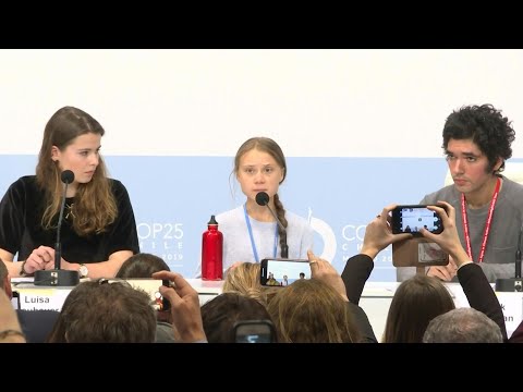 Young climate activists speak at COP25 in Madrid | AFP