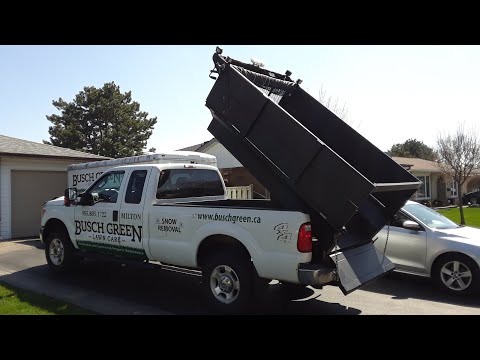 2013 Ford F250 Superduty with a 8 foot Buyers DumperDogg Insert