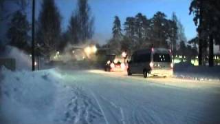 An Tka7-railcar sweeping snow from Sairaala level crossing