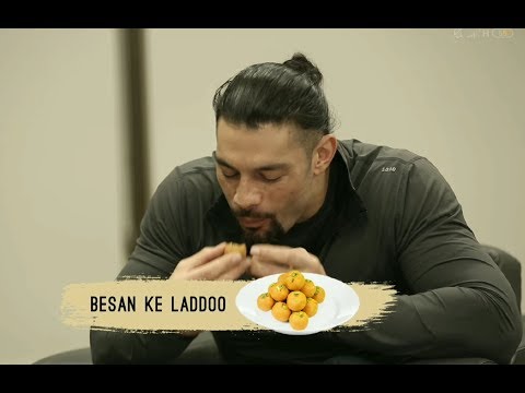 WWE Roman Reigns Eating Besan Ke Laddoo