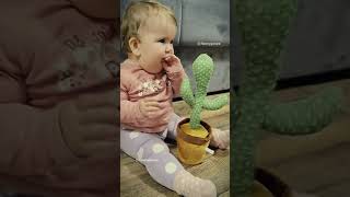 Baby with cactus