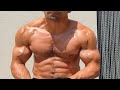 Young stud flexing huge and ripped muscles
