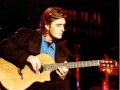 Mike Oldfield playing acoustic guitar (Amarok ...