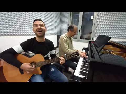 Piovono bombe acustica - Michelangelo Giordano ( #pianoforte #chitarra #voce )