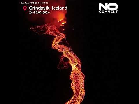 Video Thumbnail: Northern Lights shine over erupting volcano in Iceland