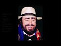 Luciano Pavarotti sings 'Funiculì, Funiculà'.